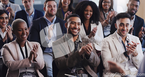 Image of Business people, conference and audience clapping hands at a seminar, workshop or training. Diversity men and women crowd applause at conference or convention for corporate success, bonus or growth