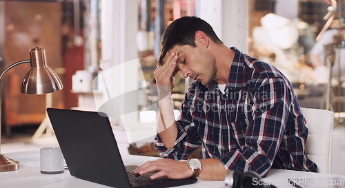 Image of Headache, tired and a man with a laptop and burnout from an email, project or communication. Stress, anxiety and a businessman reading a chat on a computer about a mistake or work fail in office