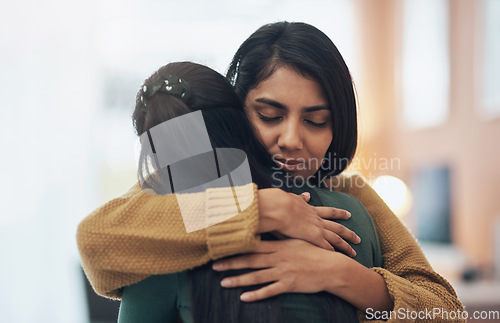 Image of Friends, hug and support of women together in a house with love, care and empathy. Indian sisters or female family in a room while sad, depressed and hugging for comfort, trust and quality time