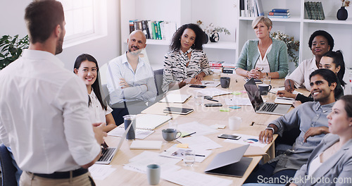 Image of Diversity, businesspeople planning and sitting at table in a boardroom at workplace. Presentation or business meeting, collaboration and people talking or brainstorming together at their work