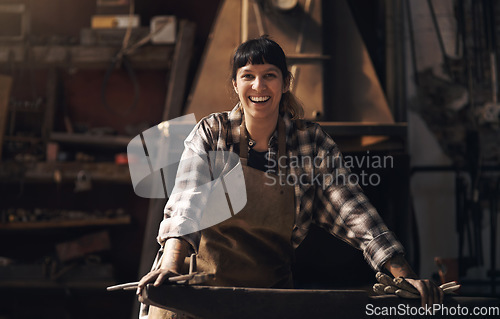 Image of Foundry, warehouse and portrait of woman with tools for industry, manufacturing and manual labor. Industrial factory, welding and female person for steel, iron and metal production for craftsmanship