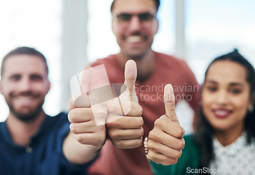 Image of Hands, thumbs up and emoji with a business team closeup in an office together to gesture yes or thank you. Success, motivation and teamwork with a group of colleagues or employees at work for support