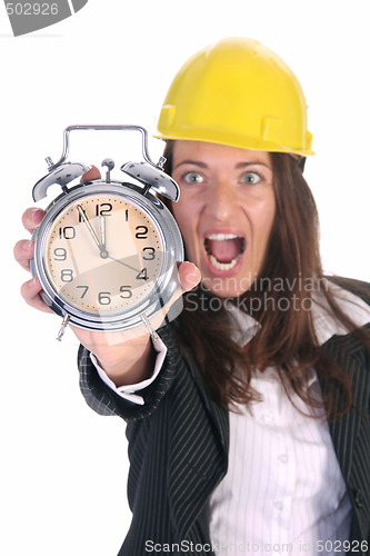 Image of businesswoman confused and clock 
