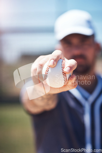 Image of Hand holding baseball, closeup and man for sports, field and training with blurred background in sunshine. Softball player, sport and zoom of ball for training, fitness and workout for competition