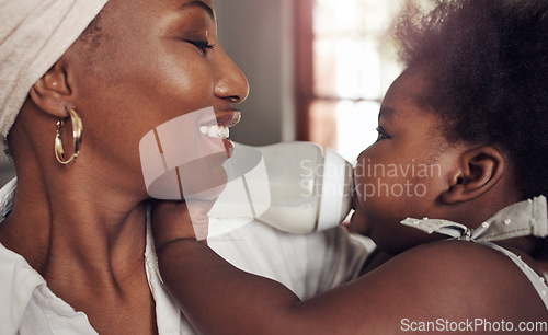 Image of Bottle, milk and happy with mother and baby for care, bonding and morning. Smile, happiness and food with black woman and feeding newborn infant in family home for nutrition, wellness and growth