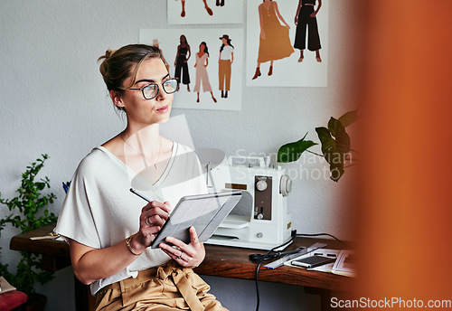 Image of Fashion, design and woman with tablet, thinking and creative ideas for small business process in studio. Creativity, textile and designer working on digital sketch with idea pattern and illustration.