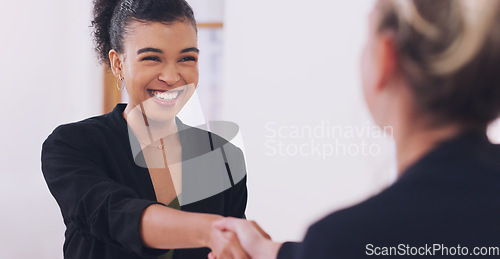 Image of Hand shake, women and happiness for welcome, agreement or deal for onboarding at law firm. African woman, lawyer and shaking hands for recruitment, teamwork or congratulations with smile in workplace