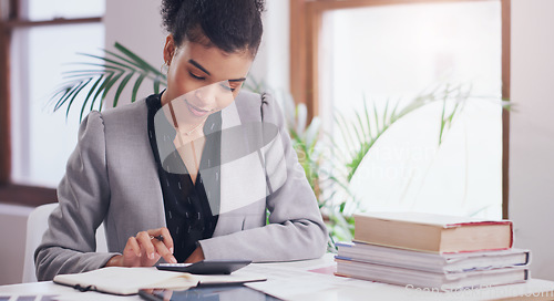 Image of Calculator, accounting and woman writing in notebook for finance budget, investment or planning. African person as accountant with tax list on business profit, financial goals or income in office