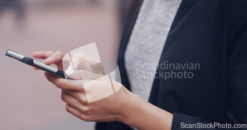 Image of Hands, phone and business woman in city for closeup texting, networking or email communication on internet. Businesswoman, smartphone and typing in metro street with social media app, chat or contact