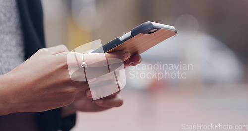 Image of Female hands, web and smartphone in the city calling and texting in the street. Woman, hand and phone for typing, outdoor and searching message with internet for communication on app.