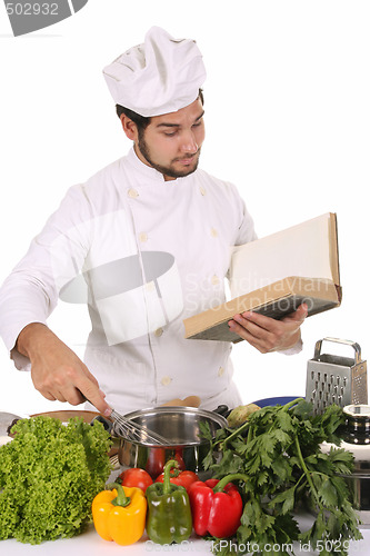 Image of young chef preparing lunch