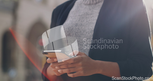 Image of Hands, phone and business woman with closeup in city, texting and networking for email communication on web. Businesswoman, smartphone or typing in metro street for social media app, chat and contact