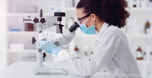 Image of Microscope, research and woman scientist in a lab for science, medicine and data analysis. Laboratory, healthcare and female health expert checking medical, results and working on a cure for cancer