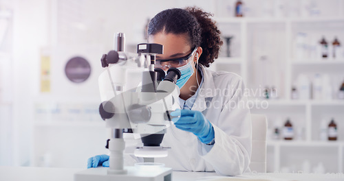 Image of Science, covid and pharmacy with woman and microscope in laboratory for expert research, medical and planning. Idea, vaccine analysis and medicine with female scientist for chemistry and healthcare