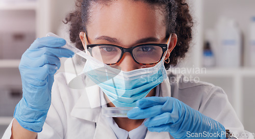 Image of Woman scientist, dropper and face mask with focus on futuristic research and virus data. Science, African female person and young employee working in a laboratory with chemistry test analysis