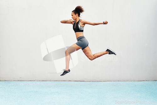 Image of Woman, fitness and running on mockup in exercise, cardio training or workout outdoors. Fit, active or sport female person or runner in sports motivation, run or healthy wellness on wall mock up space