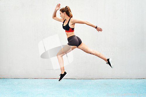 Image of Woman, fitness and running on mockup in training, exercise or cardio workout outdoors. Fit, active or sport female person or runner in sports motivation, run or healthy wellness on wall mock up space