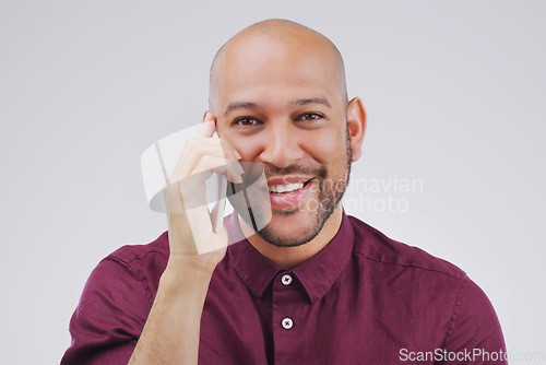 Image of Phone call, communication and portrait of man in studio for conversation, talking and chatting. Mockup, white background and face of male person on smartphone for networking, contact and connection