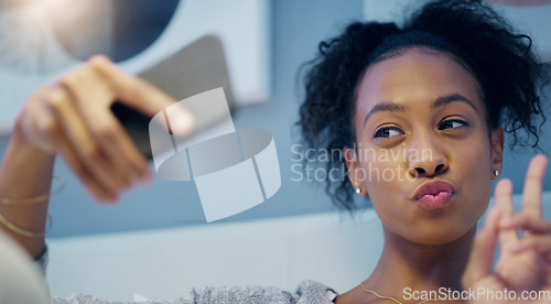 Image of African woman, selfie and bed with peace sign in home, night or pout with icon on social media app. Influencer girl, content creator or photography for profile picture, web blog or update in bedroom