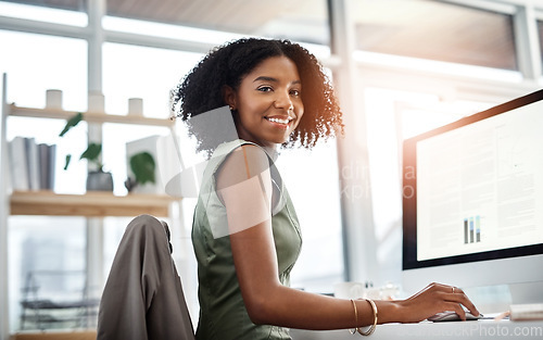 Image of Black woman in business, smile in portrait and computer screen with charts and graph, project information and analysis. Data analyst, review of corporate report and happy female employee in office