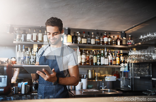 Image of Man in cafe, tablet and small business with inventory check, entrepreneur in hospitality industry and connectivity. Happy male owner, restaurant franchise with digital admin and stock taking