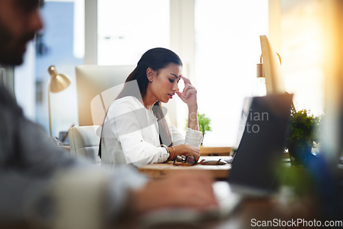 Image of Depressed, burnout or business woman with headache in office with fatigue, anxiety or stress. Employee, sad female consultant or tired person frustrated with depression or migraine pain in workplace