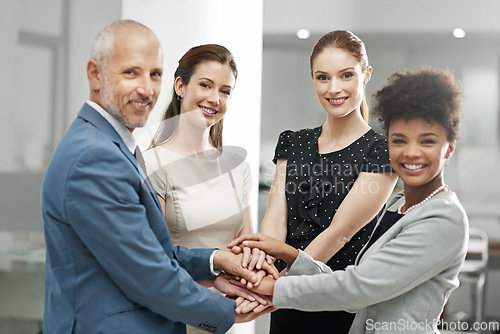 Image of Happy business people, team and portrait with hands together in agreement or trust at the office. Group piling hand for teamwork, motivation or support in solidarity for company goals at workplace