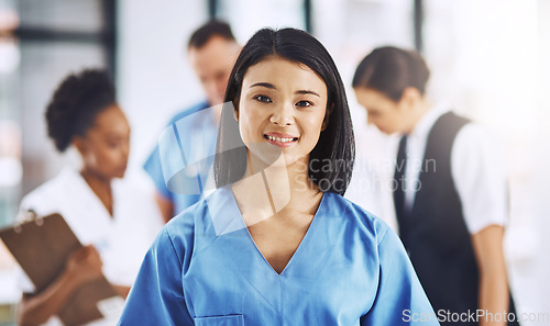 Image of Healthcare, smile and portrait of nurse in hospital for support, help and wellness in clinic. Health care, happiness and medicine, confident and Asian woman, face of medical professional or caregiver