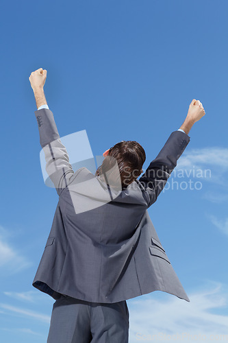 Image of Celebrate, business man and fist in air with happiness and success feeling excited from promotion. Outdoor, businessman and corporate worker with celebration from target achievement and goals