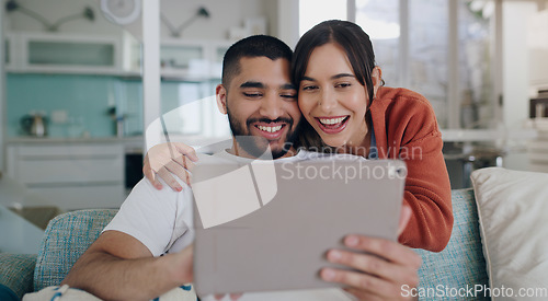 Image of Tablet, couple and smile on couch in home for social media, website and online entertainment. Happy man, excited woman and relax on digital technology, subscription or streaming connection on network