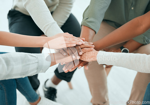 Image of Hands stack, group and team with support, care and together with solidarity, advice and empathy at job. People, friends and helping hand for teamwork, commitment and community with trust in top view