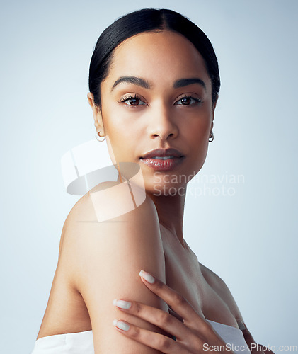 Image of Skincare, makeup and portrait of woman isolated on a white background for skin glow, shine and beauty for luxury. Face of young model or biracial person, natural cosmetics or dermatology in studio