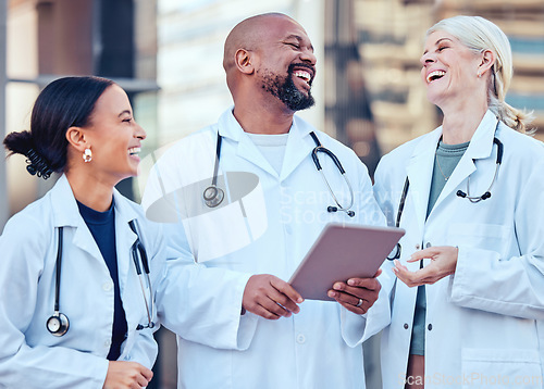 Image of Doctor team, laughing and healthcare worker with tablet and funny joke of medical group. Diversity, technology and laugh of hospital and wellness clinic staff together with happiness and tech results