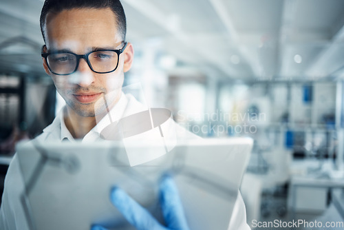 Image of Medical science, tablet and man in a laboratory for research, development and innovation. Scientist person with technology for data analysis, problem solving and formula solution for future in a lab