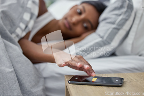 Image of Morning, woman in bed with phone alarm and time to wake up and getting ready for a fresh start of the new day. Sleep, wake and girl in bedroom with snooze on cellphone clock, swipe to rest and relax.