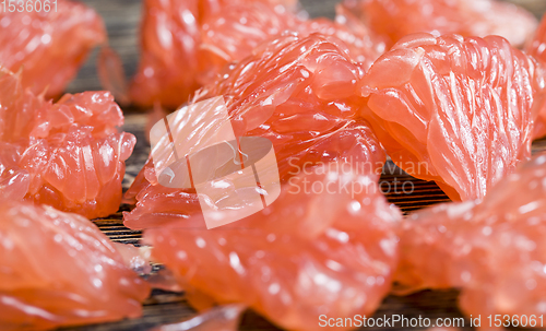 Image of a piece of peeled grapefruit