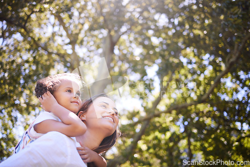 Image of Mother, child and outdoor in nature for piggyback in summer with happiness, love and care. Female person or mom and girl kid playing together at a park for family adventure, quality time and freedom