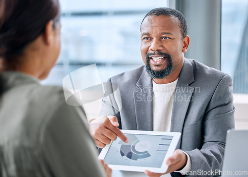 Image of Business man, woman and tablet with chart, analysis or discussion in workplace for finance, growth or investment. African financial advisor, touchscreen and graph for progress, consulting or teamwork