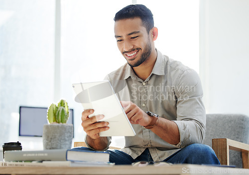 Image of Business man, tablet and email of a web analyst checking online research with a smile. Office chair, technology and employee with social media scrolling and typing on a internet app while reading