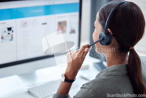 Image of Call center, telemarketing and back of female consultant working on online consultation in the office. Customer service, contact us and saleswoman planning crm with headset and computer in workplace.