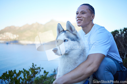 Image of Nature, dog and man with husky in mountain for hiking, walking and fresh air together by lake. Traveling, friendship and happy male person with pet canine for freedom, adventure and exercise outdoors