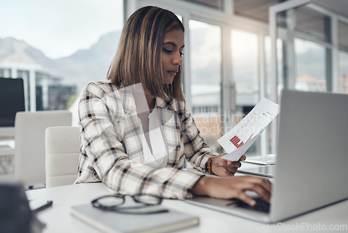 Image of Laptop, business analyst and woman typing documents in office workplace. Paperwork analysis, computer and female person reading, working and analyzing data, graphs or charts for finance statistics.