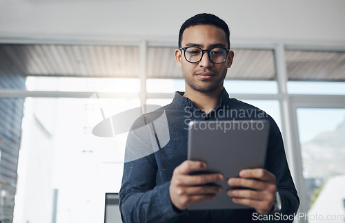 Image of Email, research and a businessman with a tablet at work for connectivity and communication. Internet, reading and a corporate worker with an online app for a professional career as a lawyer in office