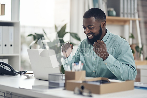 Image of Black man, success and laptop to celebrate business profit, win or achievement in a modern office. African male entrepreneur at a desk with motivation and technology for bonus, victory and promotion