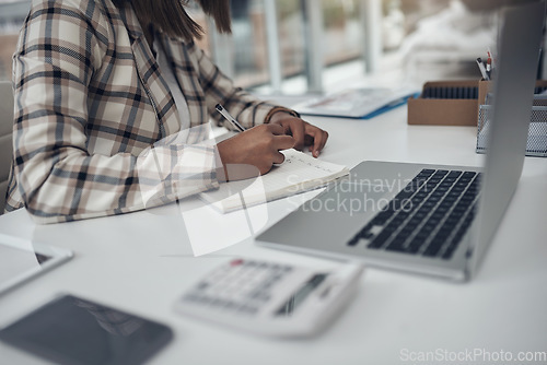 Image of Writing, notebook and woman hands for budget, startup finance or research with calculator at her office desk. Financial planning, accountant or person with journal notes, computer and accounting data