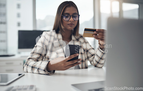 Image of Business, smartphone and woman with a credit card, ecommerce and finance sales in a modern office. Female person, employee or agent with payment, cellphone and transaction with fintech app and retail