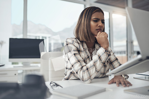 Image of Thinking, confused and business woman on computer solution, research or serious job decision or planning. Reading, review and doubt or ideas of african person or analyst on laptop for problem solving