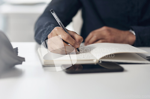 Image of Notebook, planning and business man hands writing for creative ideas, project management and schedule or goals. Timeline, list and startup employee or person notes, journal and planner on his desk