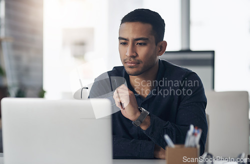 Image of Thinking, news and report with a man journalist working in his management office at the editing agency. Review, journalism and idea with a young male editor at work on an article for reporting