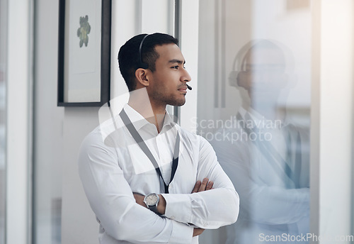 Image of Thinking, business and man with arms crossed, window and decision with choice, opportunity and headphones. Male person, employee or agent with thoughts, ideas or tech support with professional career